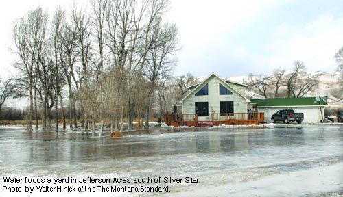 Jefferson Acres house surrounded by Jefferson River ice.