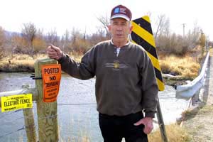 Howard Chrest near fence.