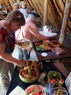 Potluck dinner in the earthlodge.